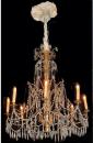 An 18th Century Genovese Parcel Gilt and Crystal Eight-Light Chandelier