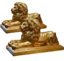 A Regal Pair of 19th Century Gilded Stoneware Lions