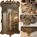 A Remarkable Early 18th Century Italian Regence Parcel Gilt and Polychrome Mirror