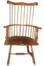 An 18th Century Carved Fruit Wood American Colonial Comb Back Armchair