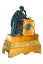 An Italian 19th Century Neoclassical Patinated and Gilt-Bronze Clock