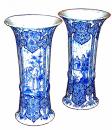 An English Pair of Intricately Decorated 19th Century Fluted Delft Beaker-form Vases
