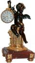A 19th Century Well-Patinated Bronze and Ormolu French Mantel Clock with a Winged Putti 