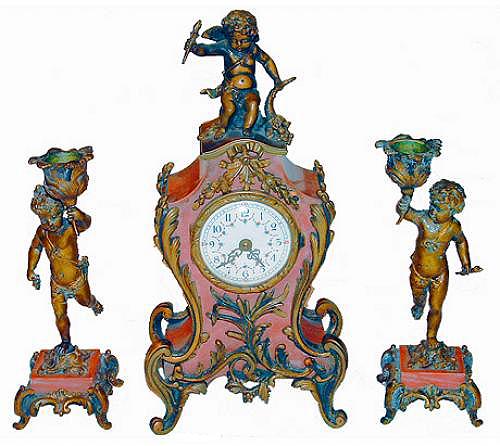 A 19th Century Louis XV en Suite Marble and Bronze Mantle Clock and Pair of Candlesticks