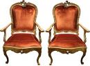  A Regal Pair of 18th Century Carved Giltwood Italian Louis XV Armchairs