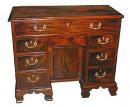 An 18th Century Yew Wood Georgian Kneehole Desk