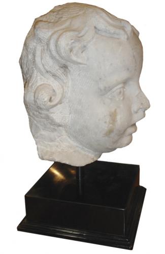 A Large Italian Lyrical Portrait of a Young Boy carved from marble