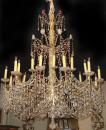 A Massive 18th Century 21-Light Genovese Parcel Gilt and Crystal Chandelier