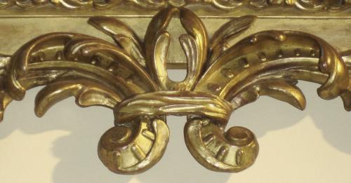 A 19th Century Italian Louis XIV transitional to Regence Carved Giltwood Mirror 