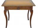 An 18th Century Rusticated French Walnut Writing Table with Embossed Leather Top 