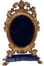 An Ovoid 18th Century Polychrome and Parcel Gilt Luccan Vanity Mirror