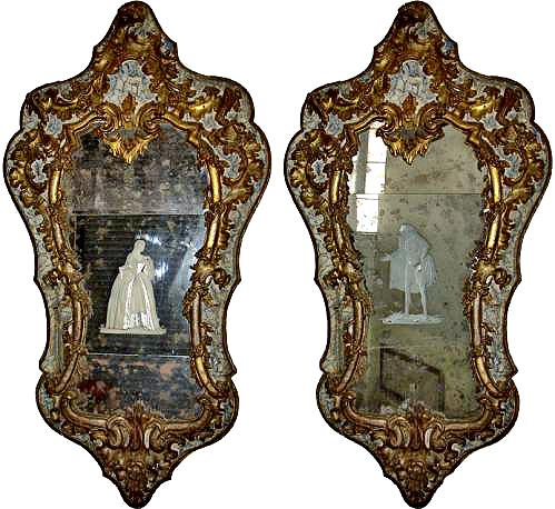 An Important Pair of Early 18th Century Giltwood and Parcel Gilt  Venetian Mirrors