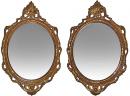 A Pair of Italian 18th Century Oval Giltwood Mirrors 