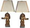 A Pair of 18th Century Italian Silver-Gilt Carved Angels now Electrified as Lamps 