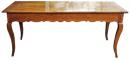A 19th Century French Louis XV Cherry wood Refectory Table with carved apron