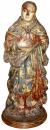 An Early 18th Century Carved Wood Polychrome and Parcel Gilt Figurine