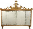 An 18th Century Italian Giltwood and Polychrome Sopraporta Mirror
