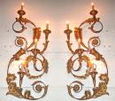 A Dramatic Pair of Gilded Carved Wood and Metal Wall Appliques