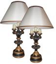A Pair of Venetian 3-Armed Black Polychrome and Parcel Giltwood Candelabras