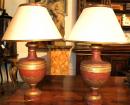 A Pair of 18th Century Giltwood and Terracotta Polychrome Urns