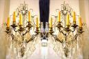 A Pair of Elegant 18th Century Italian Brass and Crystal Wall Sconces