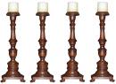 A Set of Four 19th Century Italian Walnut Candlesticks