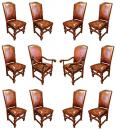 An Italian Set of Twelve 17th Century Baroque Walnut Dining Chairs (10 Side Chairs & 2 Arm Chairs)