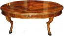 A Baroque Oval 18th Century Tuscan Walnut and Marquetry Center Table