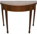 A First Quarter 19th Century Mahogany Demi-lune Folding Games Table