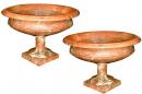 A Pair of 19th Century Peach Colored Italian Marble Urns