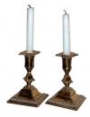 An Elegant Pair of English Brass Candlesticks