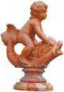 A Whimsical Early 19th  Century Terra Cotta Fountain Ornament of a Boy on a Dolphin