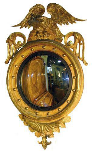 A Fine 19th Century English Giltwood and Ebonized Convex Mirror