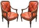 A Rare Pair of 18th Century Italian Louis XVI Walnut Arm Chairs