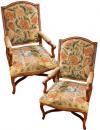 A Fine Pair of Italian Regence Arm Chairs