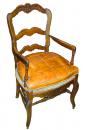 A  19th Century French Louis-Philippe Elm Armchair with carved splatrush seat and turned rails
