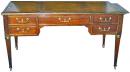 A Late 18th-Early 19th Century French Louis XVI Brass-Inlaid Mahogany Bureau-Plat