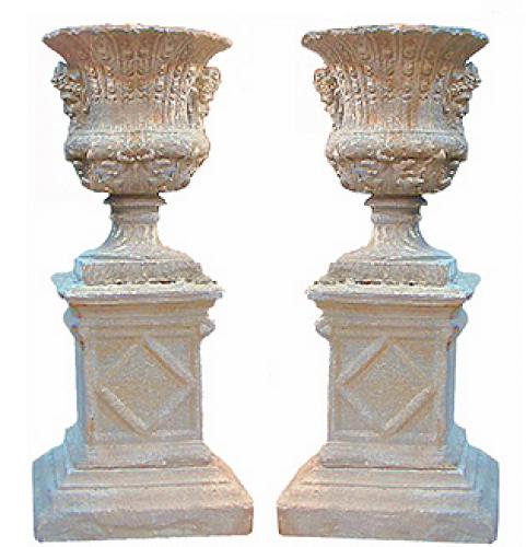 An Imposing Pair of Late 19th Century Cast Stone Borghese Urns Embellished with Bacchanalian Masks No. 2562