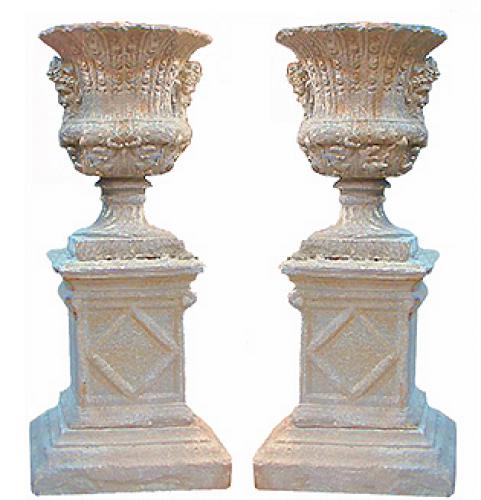 An Imposing Pair of Late 19th Century Cast Stone Borghese Urns Embellished with Bacchanalian Masks No. 2562
