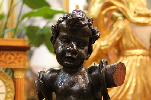 An 18th Century Italian Ebonized Walnut Statue of a Putti No. 4440