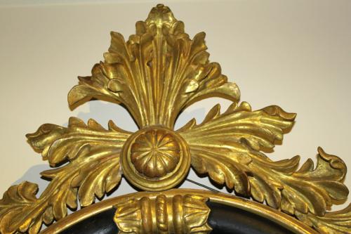 A 19th Century English Regency Carved, Ebonized and Parcel-Gilt Convex Mirror No. 528