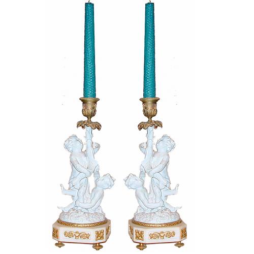 A Pair of 19th Century Bisque Putti Candlesticks No. 228